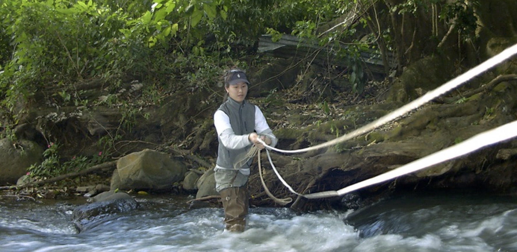 A Smith student prepares to measure stream discharge on Rio San Luis, near Monteverde, Costa Rica.